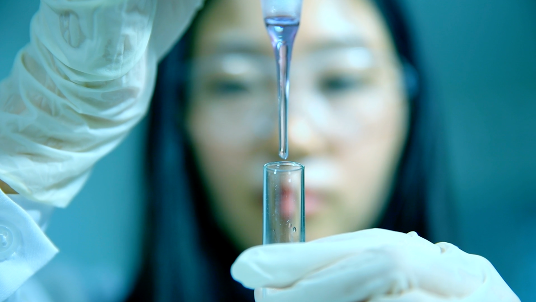 scientist with pipette