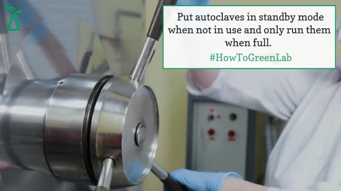 person opening a large door lock